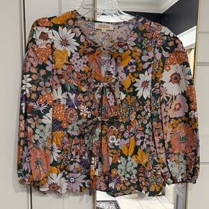 Gorgeous Boutique tie front peplum blouse